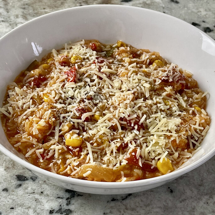 stuffed pepper soup in a white bowl