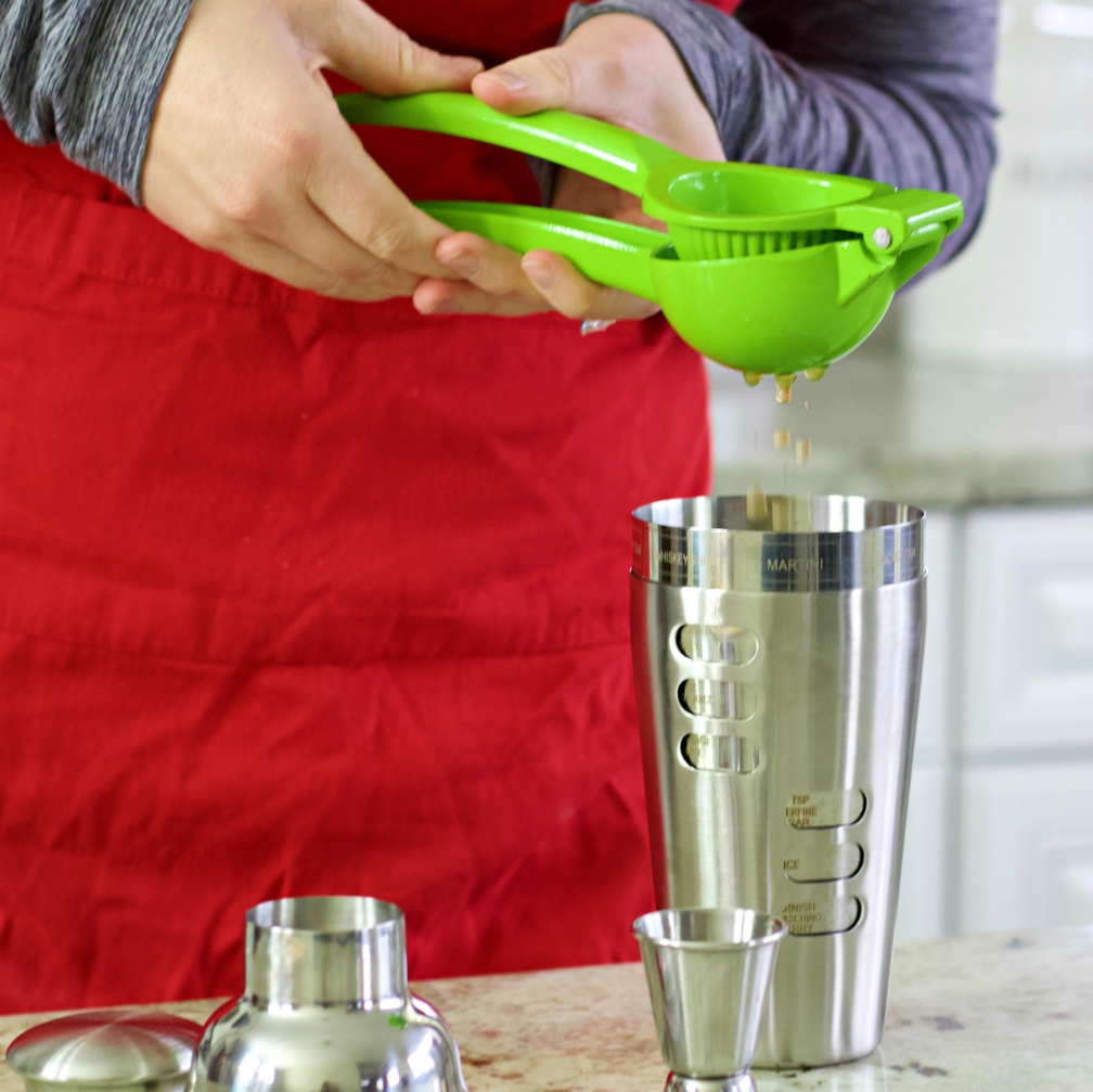 squeeze orange juice into shaker