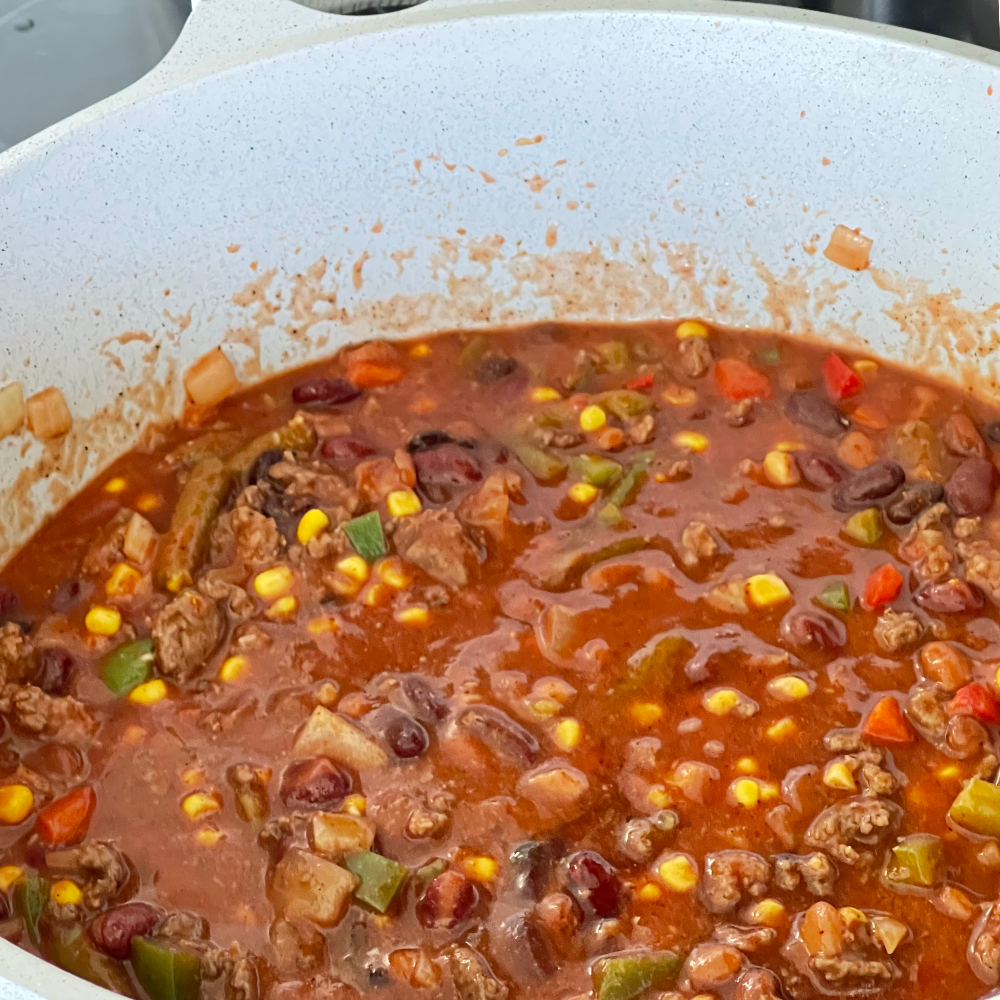 game day chili on the stove