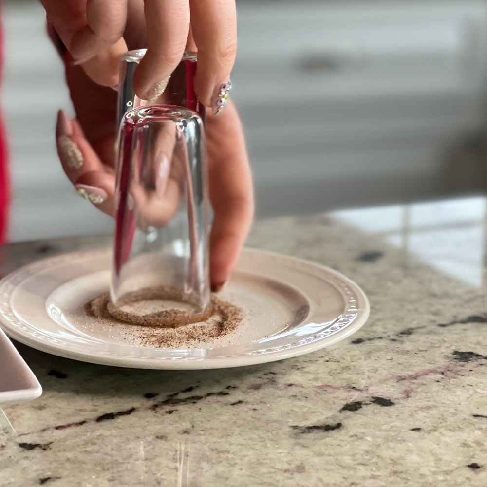 rimming a shot with cinnamon sugar