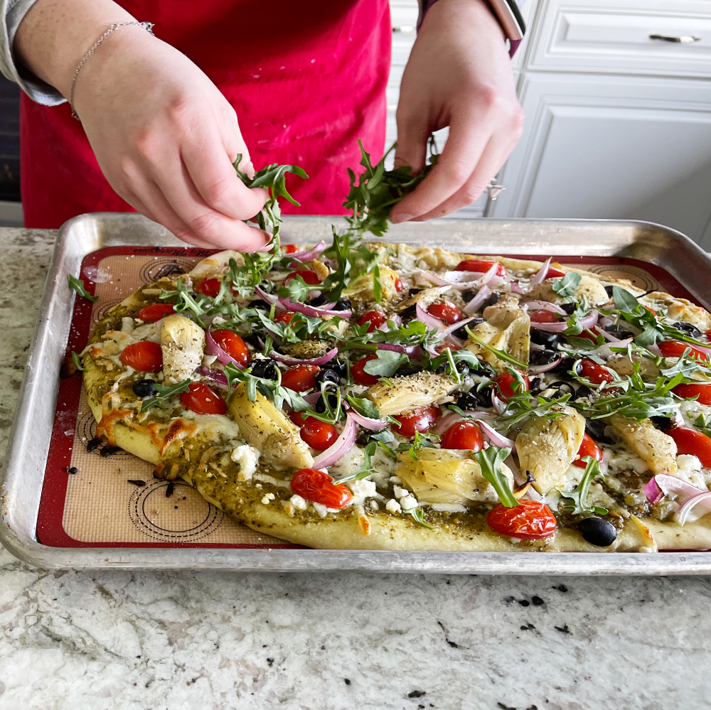 finishing with arugula-Mediterranean Flatbread