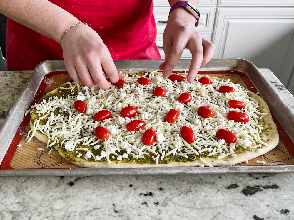 assembling Mediterranean flatbread