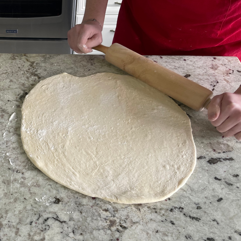 rolling out flatbread