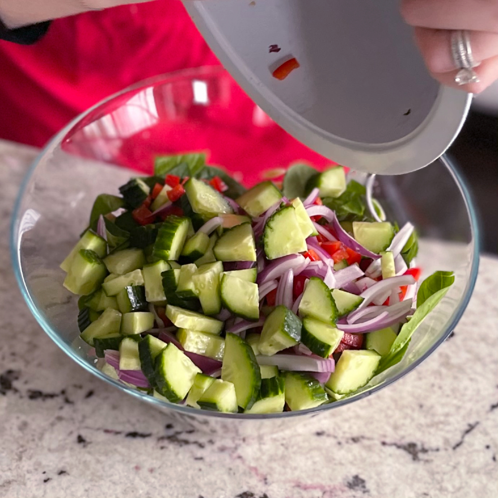 Delicious Greek Orzo Salad with Feta 17 Add the vegetables to orzo in salad bowl