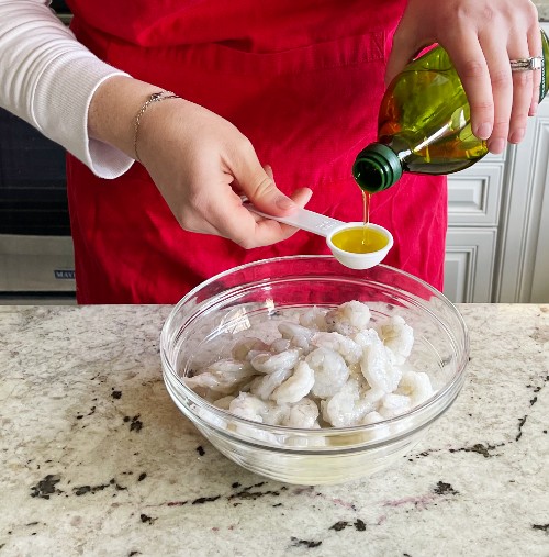 Mediterranean Shrimp Sheet Pan Dinner 14 measuring olive oil