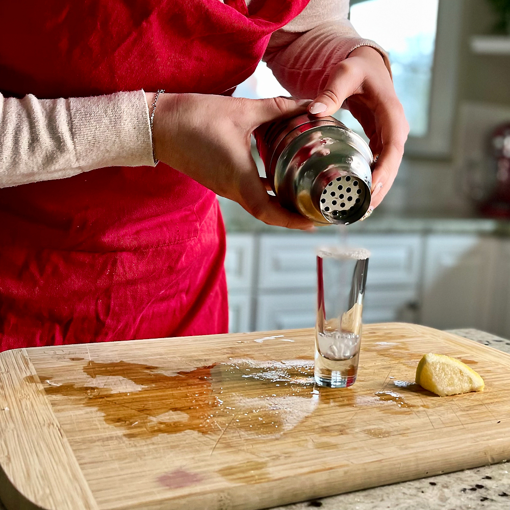pouring a lemon drop shot