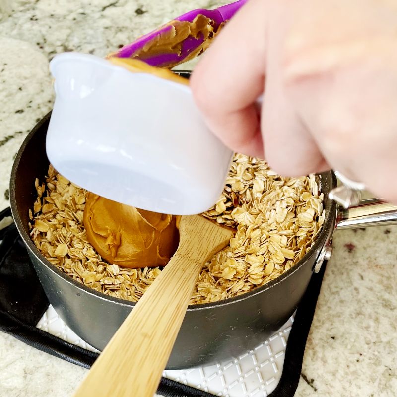 No Bake Cookies Recipe 13 adding peanut butter,vanilla and oatmeal to finish cookies.