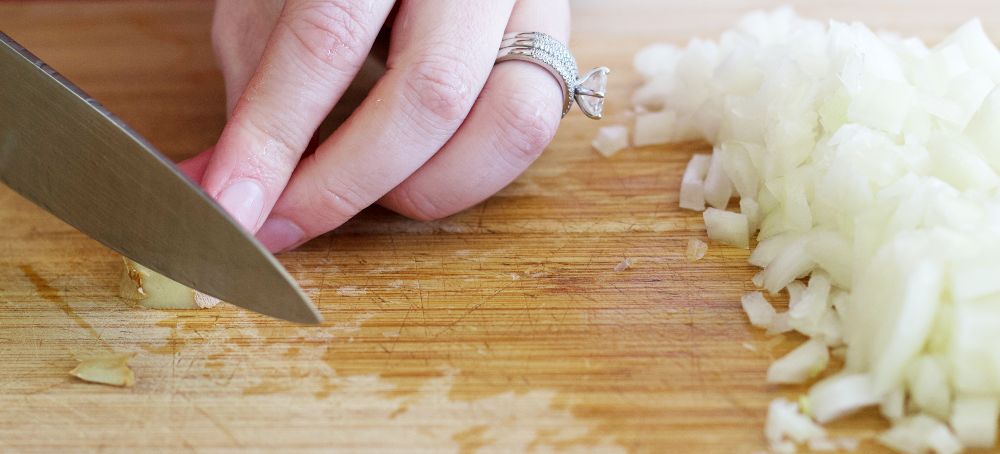 chopping ginger and onions