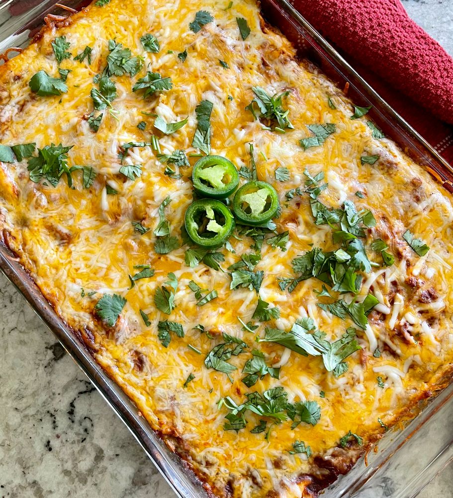 chicken enchilada casserole with red towel