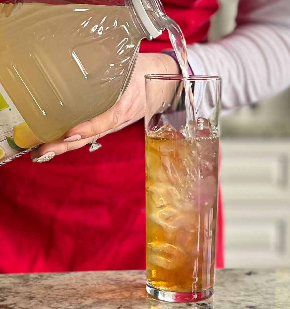 pouring lemonade arnold palmer