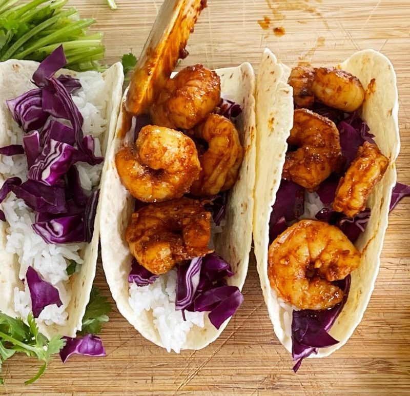 adding shrimp to taco rotated e1622774580352