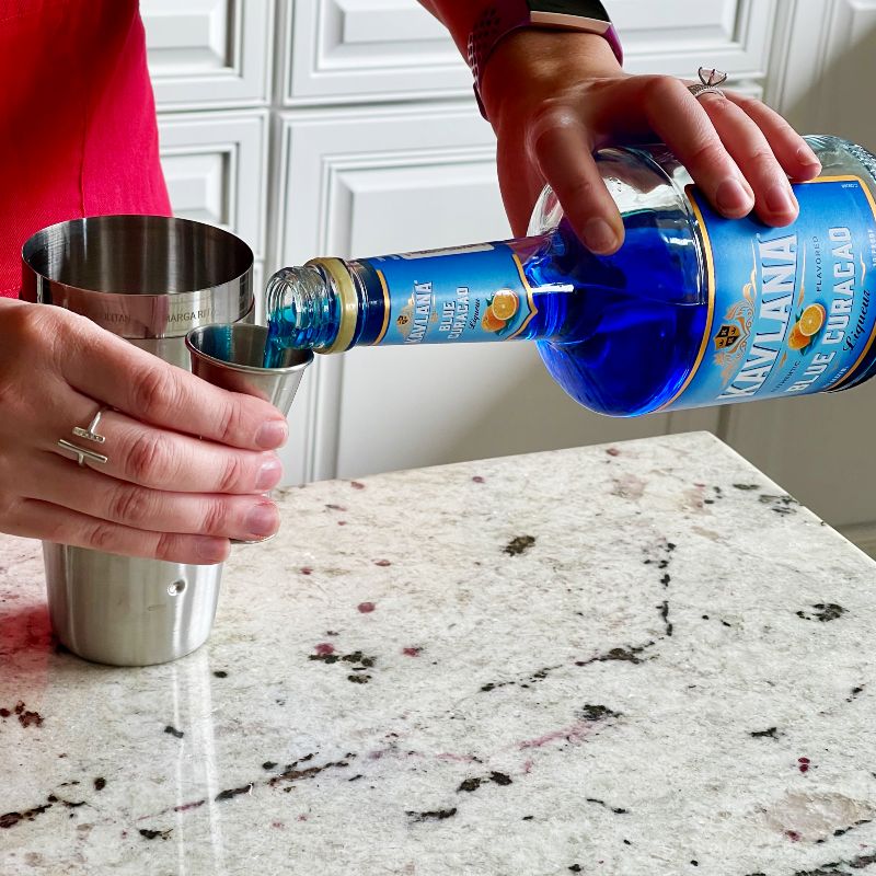 pouring blue curacao