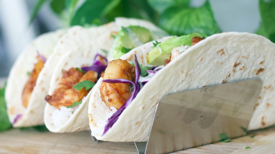 shrimp tacos in a taco holder