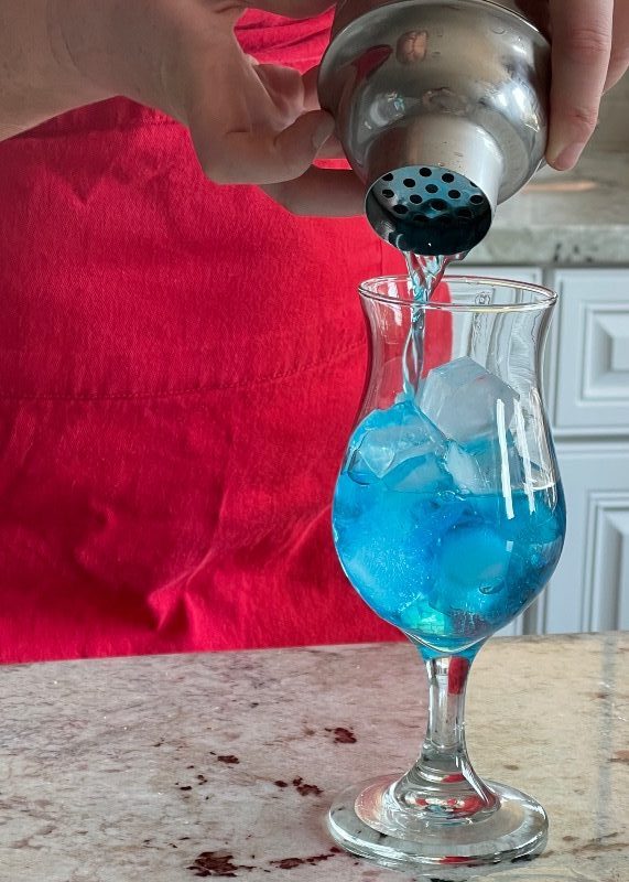 pouring blue motorcycle