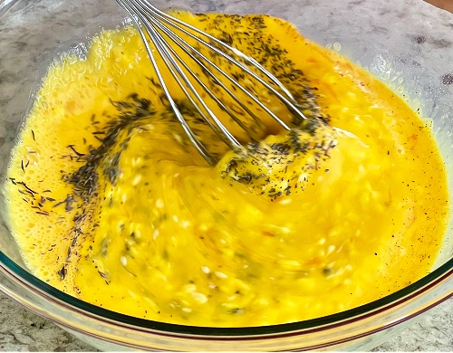 whisking in seasonings