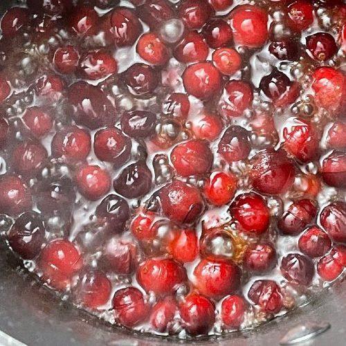 cooking cranberries, pumpkin, oil and maple syrup