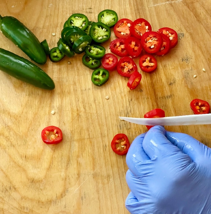 slicing jalape&ntilde;o -glove on