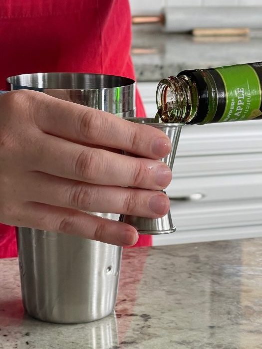 pouring green apple pucker