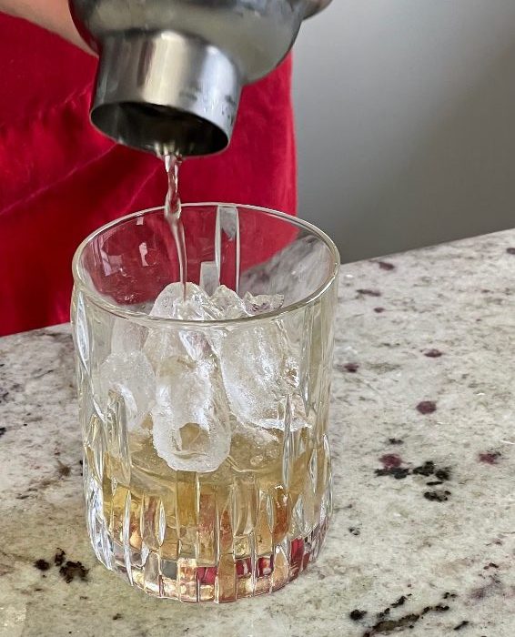 pouring crown royal maple cocktail