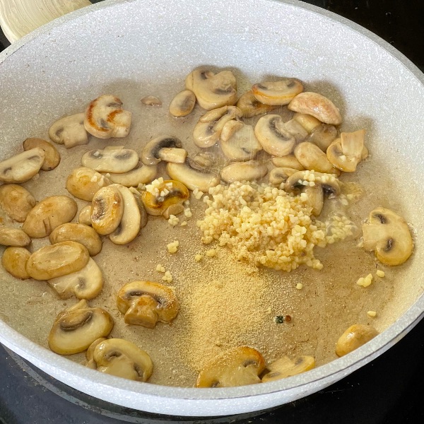 browning mushrooms with onion and garlic