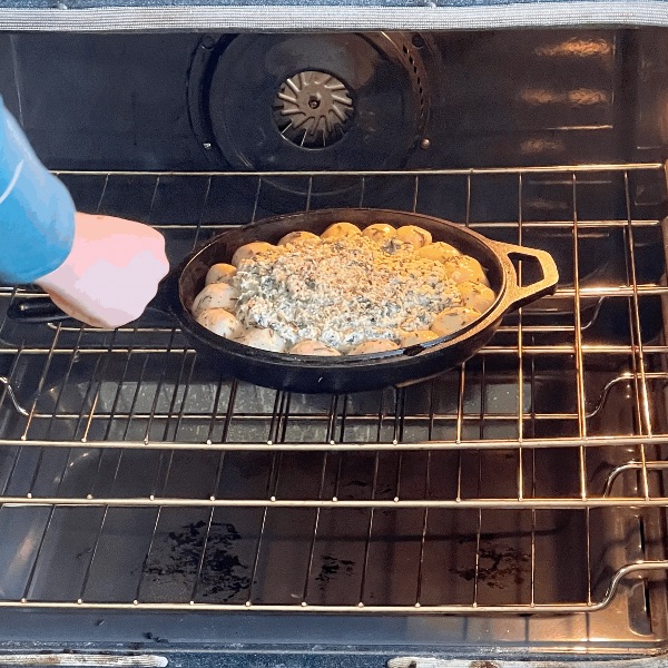 setting pull apart bread into oven