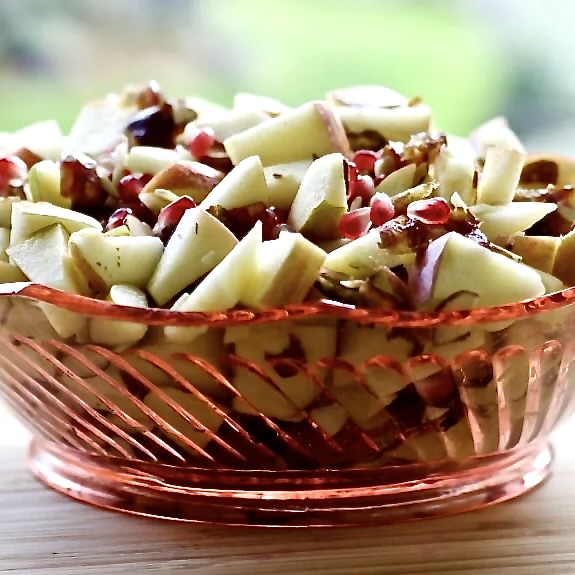 Apple yogurt Salad undressed in a glass bowl