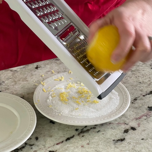 Simple Lemon Cake Martini Recipe 5 zesting a lemon