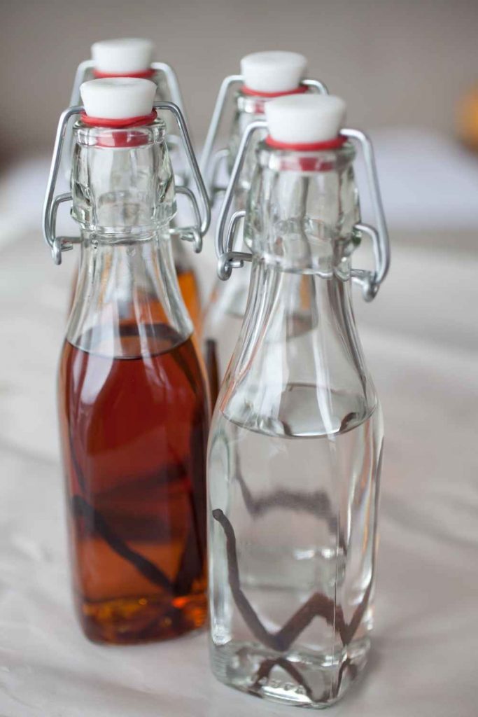 vanilla beans and vodka in bottle