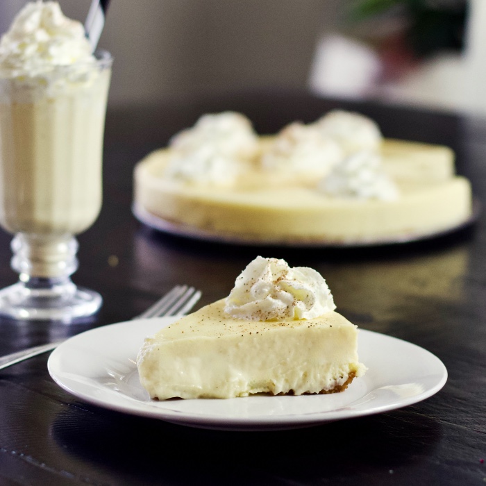 eggnog cheesecake slice on white plate