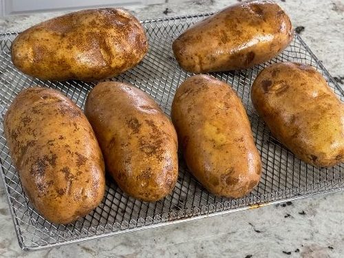 Easy Air Fryer Baked Potatoes 7 washed and oiled potatoes