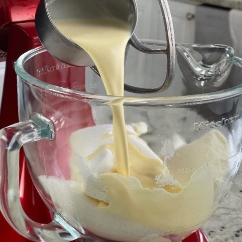 adding eggnog to cheesecake batter