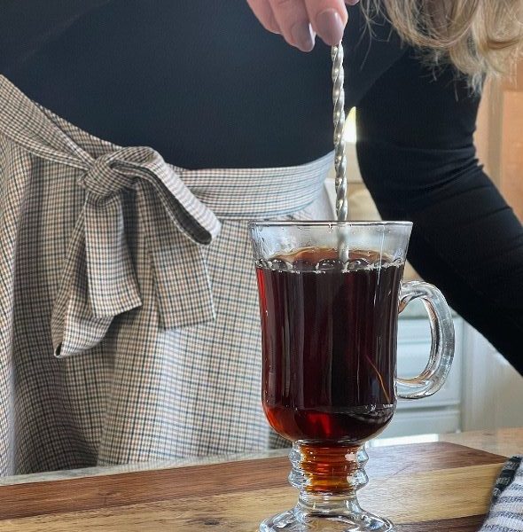 stirring coffee peppermint cocktail