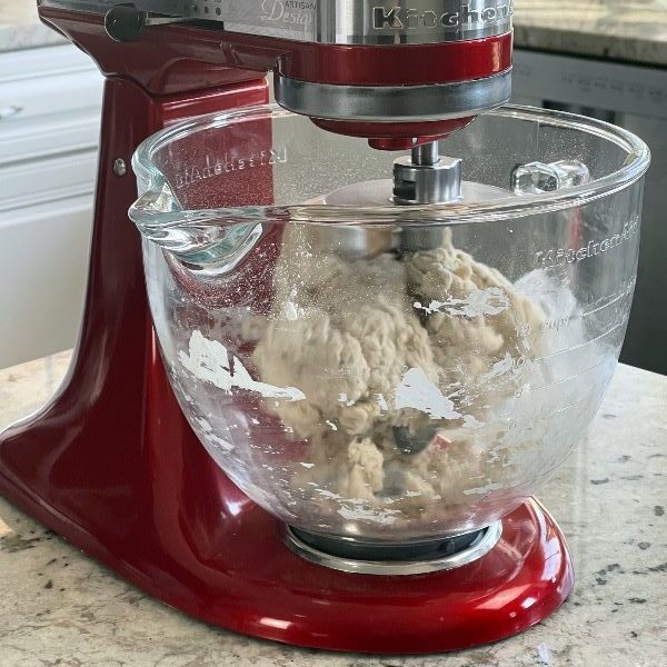 mixing pizza dough