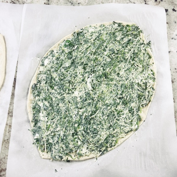 bottom crust with filling spread on it.