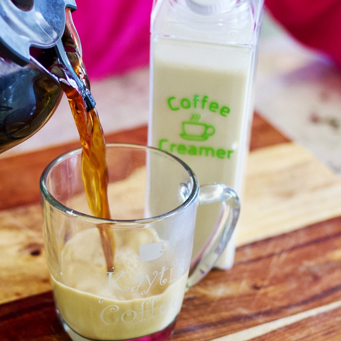 pouring coffee into creamer