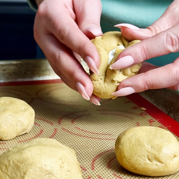 pull up the cookies dough around the marshmallow creme