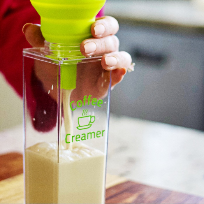 pouring coffee creamer into an air tight container