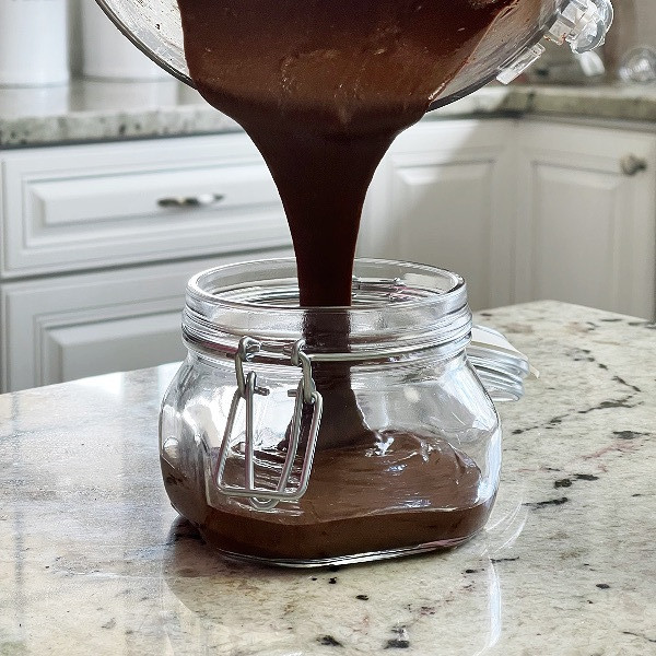 pouring homemade Nutella. Nutella Recipes made from scratch are the best.