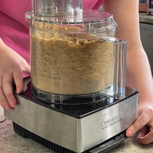 whirring hazelnuts in the food processor