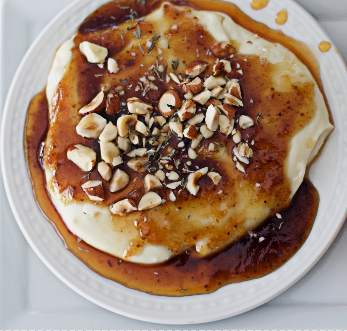 whipped brie with fig jam, hot honey and hazel nuts