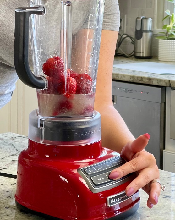 blending strawberry daiquiris