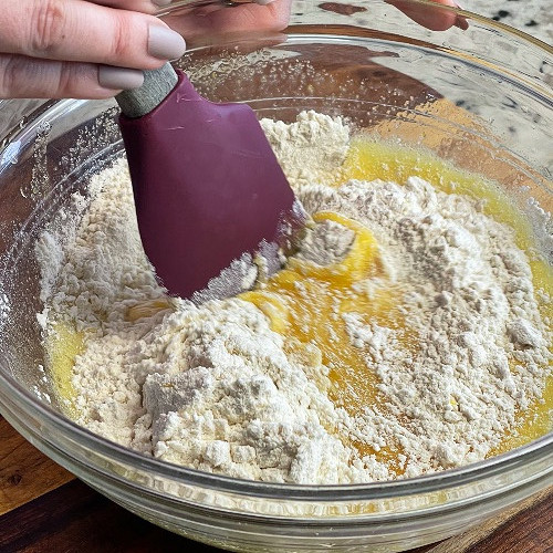 folding in flour to waffle batter