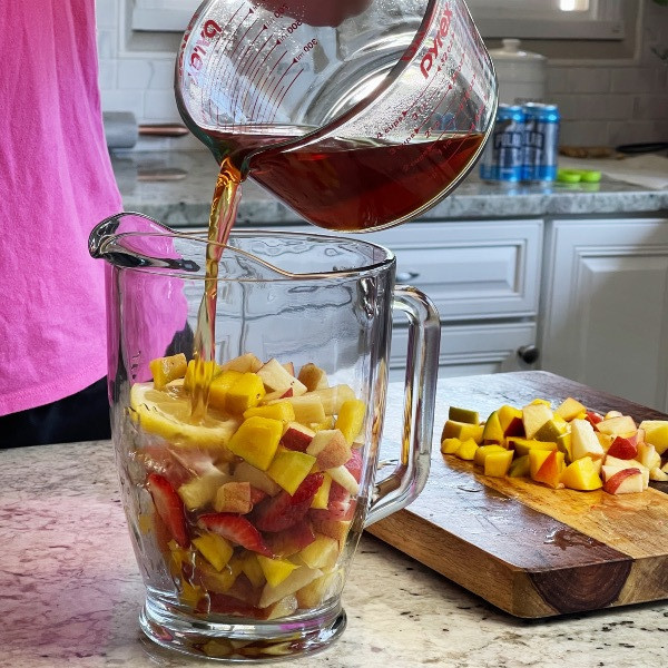 assembling sangria mocktail