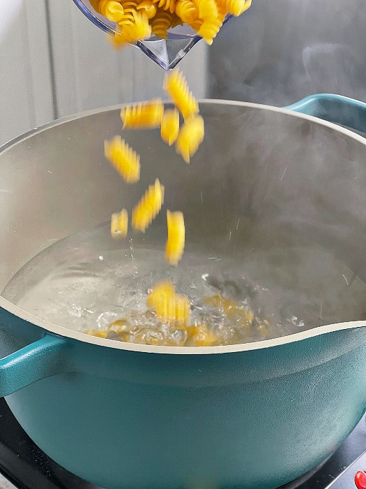 boiling pasta in a pot of water