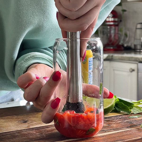 strawberry basil mojito mocktail-muddling