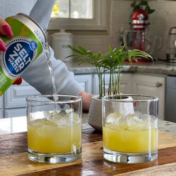 pouring seltzer water