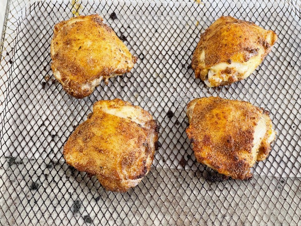 baked chicken thighs on air fryer tray