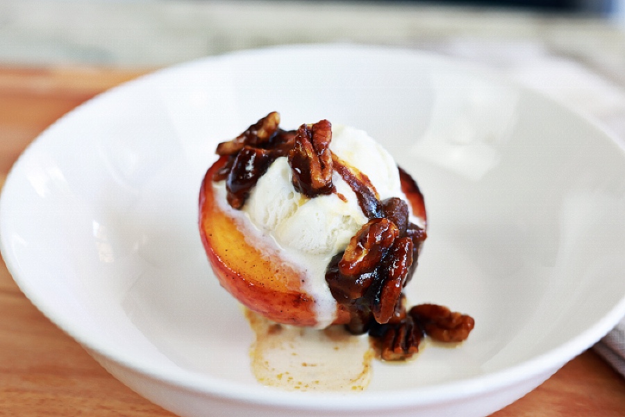 candied pecans over fried peach dessert
