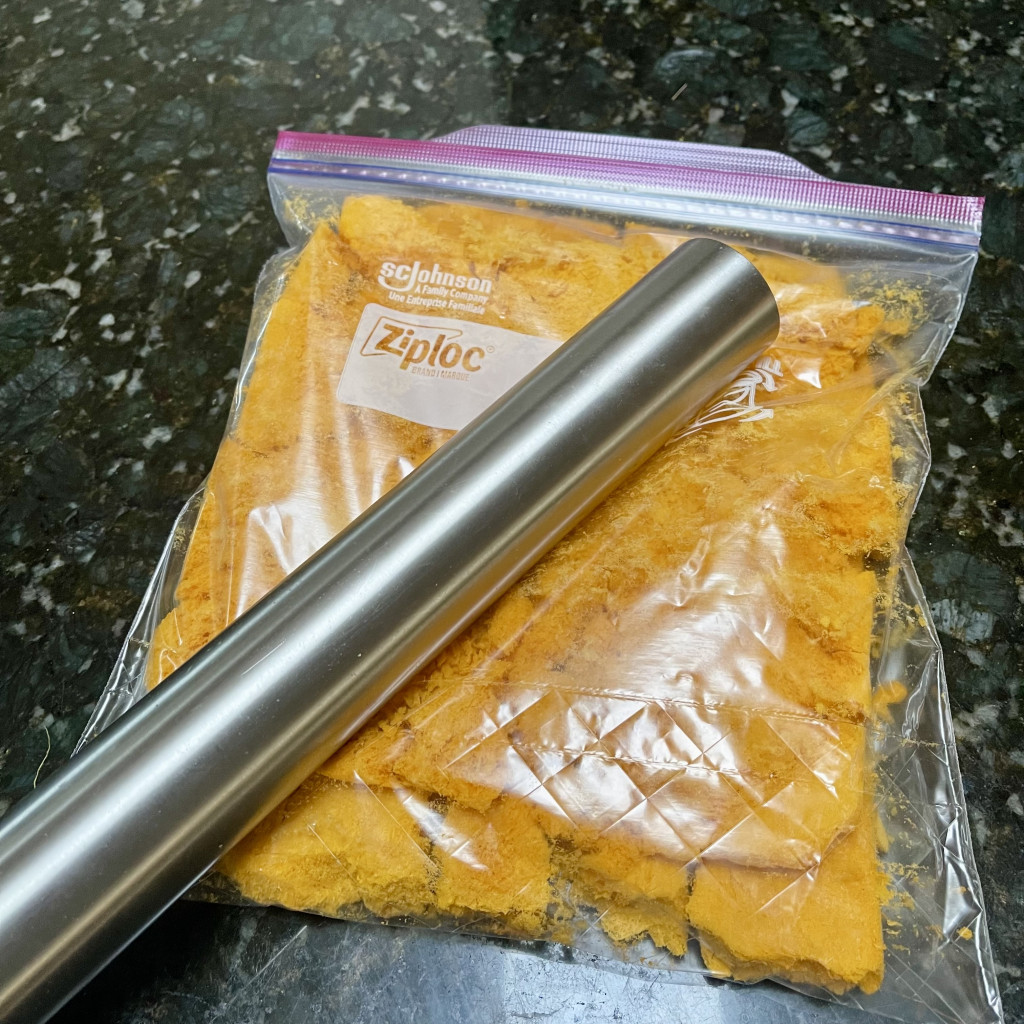 Oxygen Absorbers for Freeze-Dried Food: How and When to Use Them 2 freeze dried pumpkin puree in a bag with rolling pin