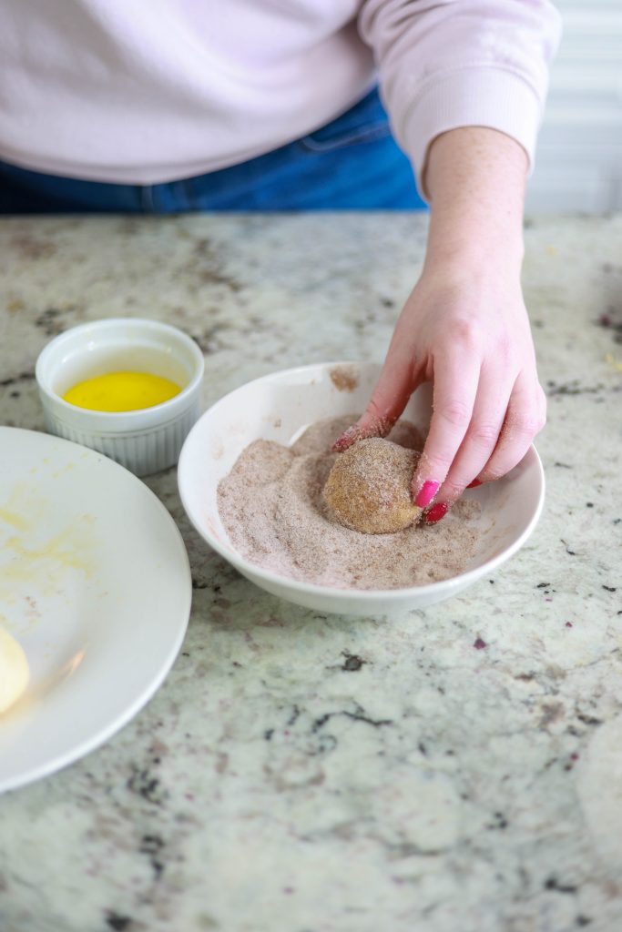 sourdough discard donuts rolled in cinnamon and sugar coating